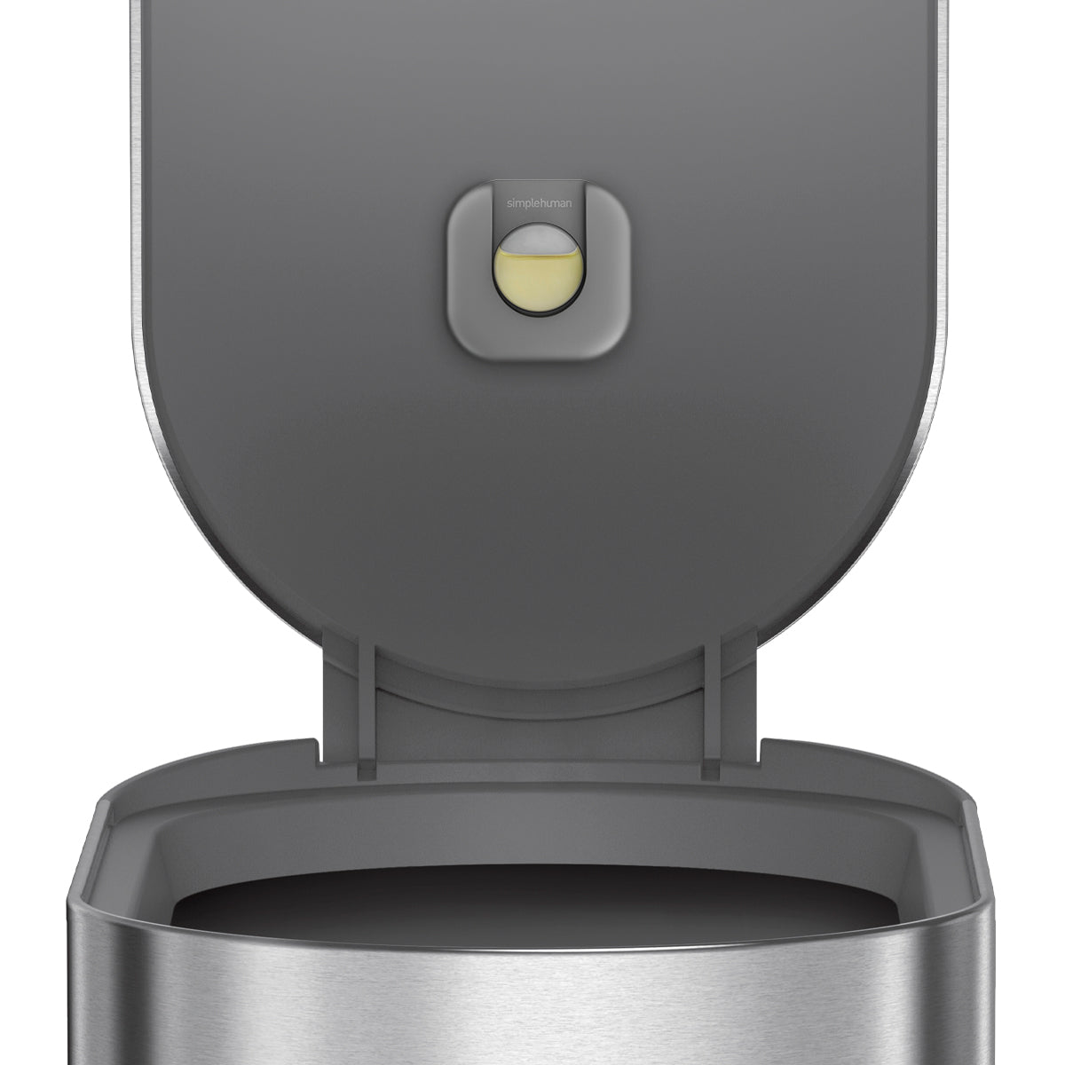 Detail view of Simplehuman Brushed Stainless Steel Step Can showing lid, liner rim, and odor-absorbing pod holder.