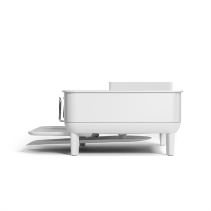 Profile view of Simplehuman Compact Steel Frame Dishrack in White, showing integrated elevated legs and extending drip tray.