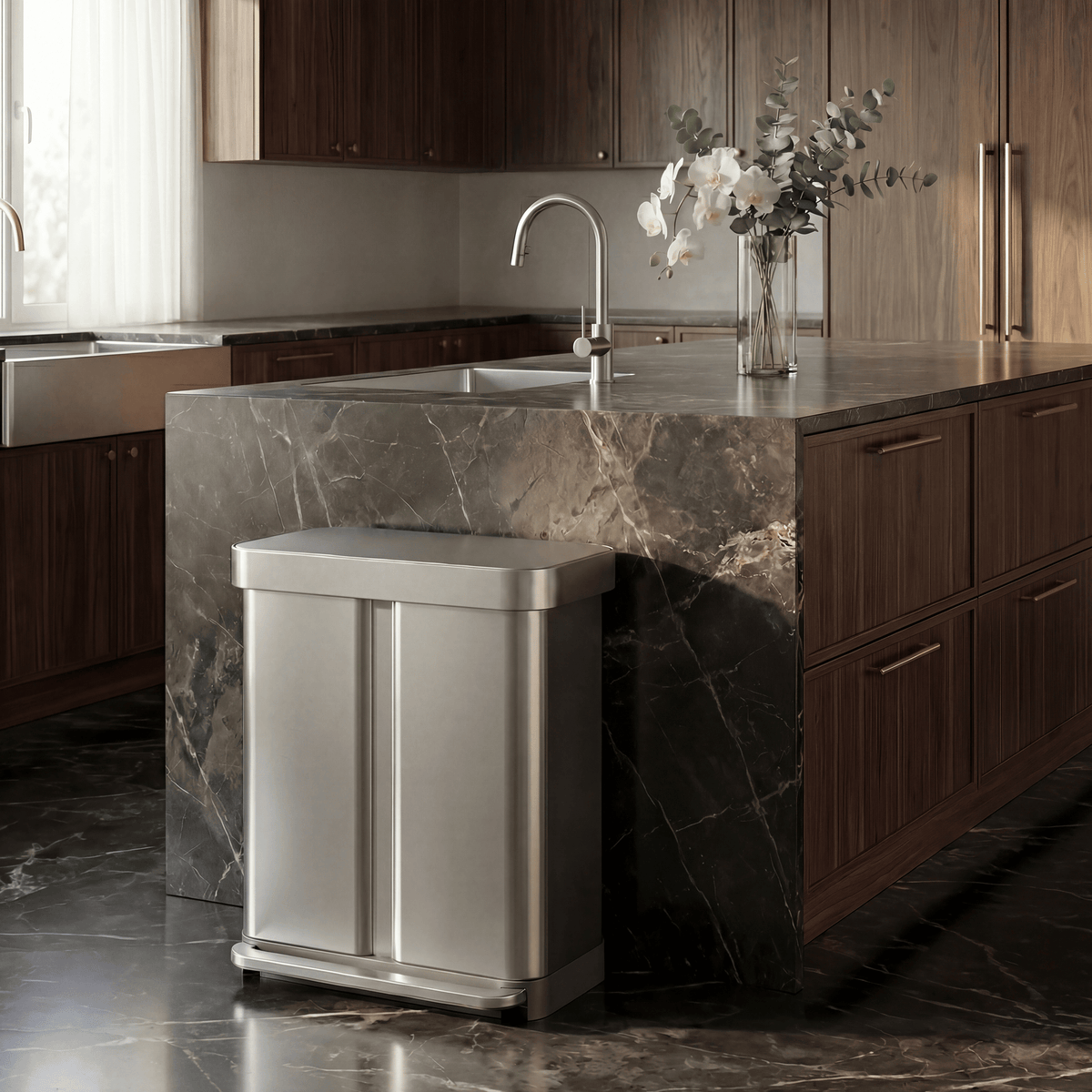 Simplehuman's 58L Step Recycler in Brushed in a modern kitchen setting white dark marble flooring and countertop featuring wooden cabinetry.