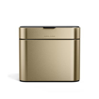 Simplehuman Brass Compost Caddy, tight front view showing odor-proof seal and magnetic latch.